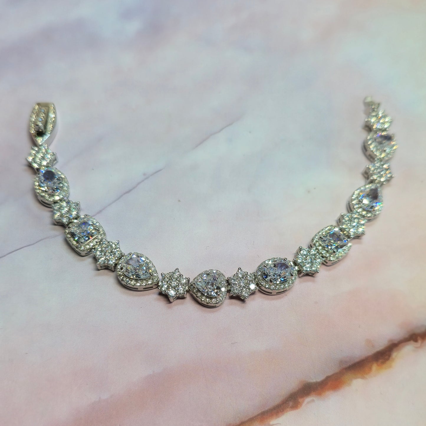 Bransoletka srebrna rodowana bogato zdobiona cyrkoniami Queen’s Diamond Empire